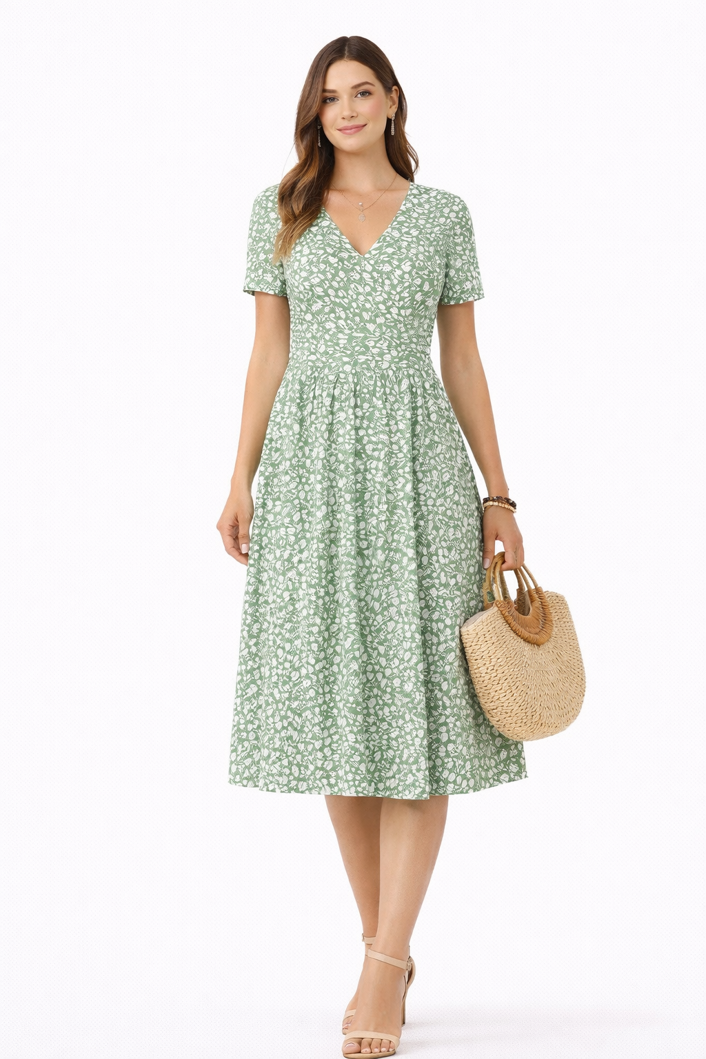 Vestido cruzado de manga corta con estampado floral sutil ideal para un look fresco y elegante Laura