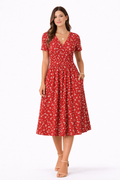 Vestido cruzado de manga corta con estampado floral sutil ideal para un look fresco y elegante Laura