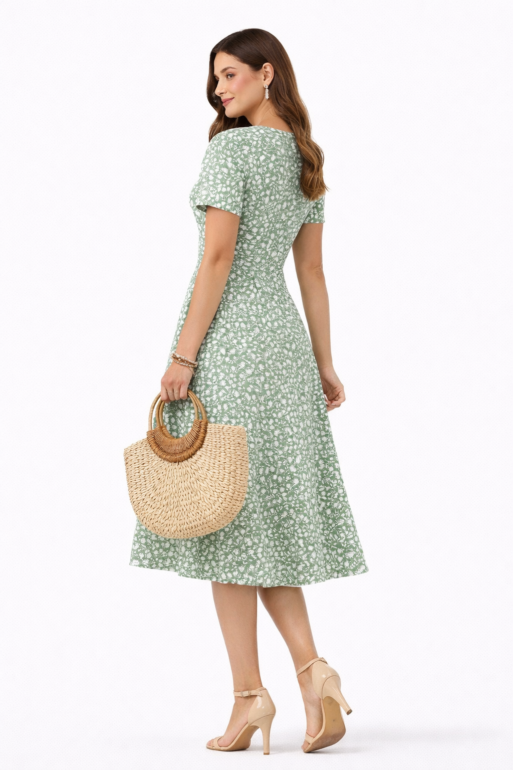 Vestido cruzado de manga corta con estampado floral sutil ideal para un look fresco y elegante Laura